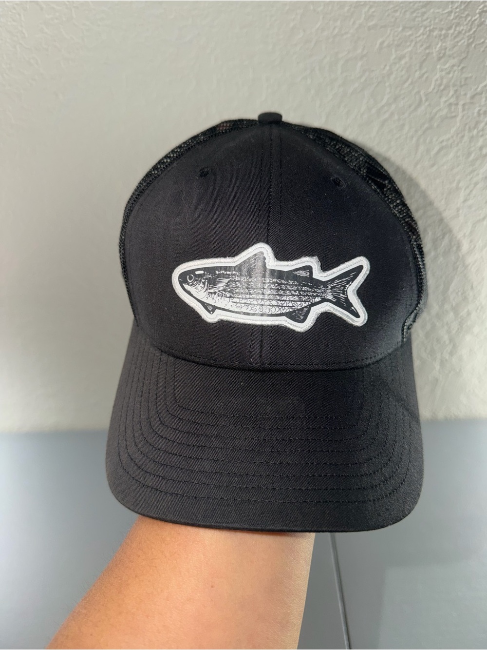 Unbranded Black Trucker Hat with White Fish Patch
